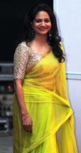 Tollywood Singer Sunitha Stills In Transparent Yellow Saree